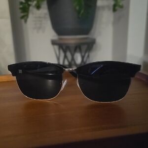 Sleek Black Half-Rim Sunglasses